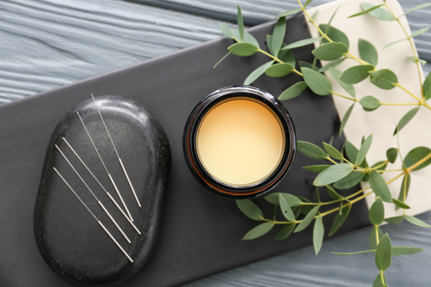 picture of a table with acupuncture needles in a natural setting